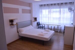 Posteľ alebo postele v izbe v ubytovaní ArArAt Hostel