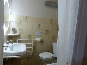 Ванна кімната в Les volets verts