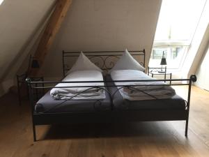 Postel nebo postele na pokoji v ubytování BnB Hopfengrün Langenthal