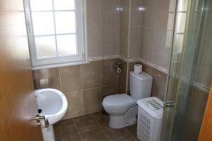 Koupelna v ubytování Apartamentos Lidia + 29 fotografií