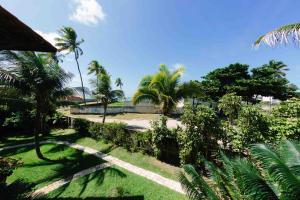 Um jardim em Pousada Hibiscus