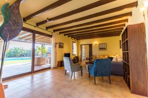 a living room with a couch and a table at Los Granados in La Oliva