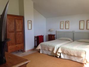 Postel nebo postele na pokoji v ubytování Hotel Boutique Moli El Canyisset