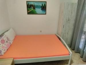 Postel nebo postele na pokoji v ubytování Apartmani Sofija