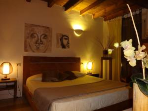 Letto o letti in una camera di Hotel Al Convento