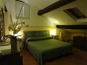 Letto o letti in una camera di Hotel Al Convento