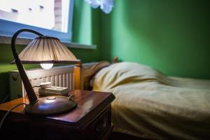Łóżko lub łóżka w pokoju w obiekcie Noclegi na Polnej