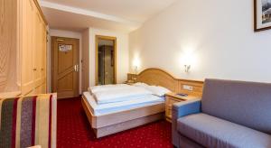 Postel nebo postele na pokoji v ubytování Hotel Vernel