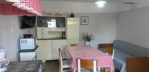 Kuchyň nebo kuchyňský kout v ubytování Rural Apartment Carolina