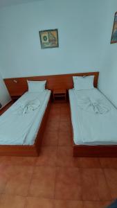 Postel nebo postele na pokoji v ubytování Hotel Bon Relax