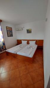 Postel nebo postele na pokoji v ubytování Hotel Bon Relax