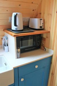 Kuchyň nebo kuchyňský kout v ubytování Cairnfold Cabins