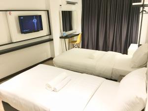Postel nebo postele na pokoji v ubytování TEXAS INN