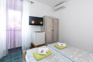 Fotografia z galérie ubytovania PAPE PUNAT apartmani i sobe v destinácii Punat
