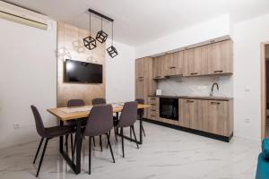 Kuchyň nebo kuchyňský kout v ubytování Euroholiday apartments