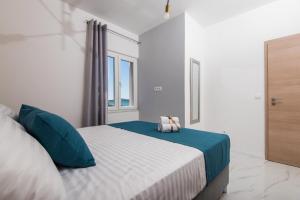 Postel nebo postele na pokoji v ubytování Euroholiday apartments