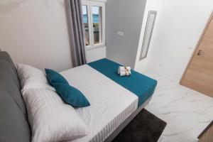 Postel nebo postele na pokoji v ubytování Euroholiday apartments