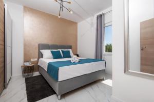 Postel nebo postele na pokoji v ubytování Euroholiday apartments