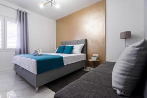 Postel nebo postele na pokoji v ubytování Euroholiday apartments