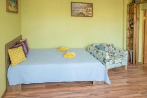 Ein Bett oder Betten in einem Zimmer der Unterkunft Old Libau