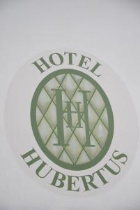 Vottorð, verðlaun, skilti eða annað skjal til sýnis á Hotel Hubertus