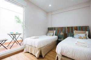 Afbeelding uit fotogalerij van Hostly Sol 2bdr flat with patio in Seville center in Sevilla