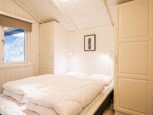 Postel nebo postele na pokoji v ubytování Holiday home Henne XIV