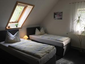 Postel nebo postele na pokoji v ubytování Ferien in Sachsen