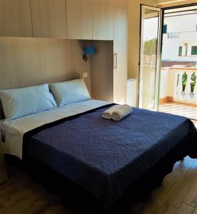 En eller flere senger på et rom på Residenza Villa Angelina Tropea