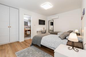 Ein Bett oder Betten in einem Zimmer der Unterkunft Accommodation TRI MURVE