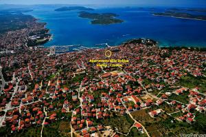 an aerial view of a city and the water at Sunny Bobica Apartments in Vodice