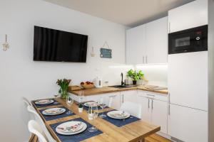 Dapur atau dapur kecil di Apartament 2B Blue Marine Poddąbie