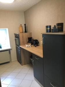 Kuchyň nebo kuchyňský kout v ubytování Ferien in Sachsen