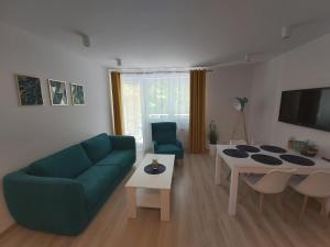 Część wypoczynkowa w obiekcie Apartament Przy Lesie Słoneczne Tarasy