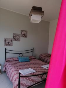 Postel nebo postele na pokoji v ubytování Nido d'amore