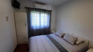 Postel nebo postele na pokoji v ubytování Casa de Vilarinho