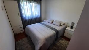 Postel nebo postele na pokoji v ubytování Casa de Vilarinho