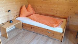 Ένα ή περισσότερα κρεβάτια σε δωμάτιο στο Raddörfl-Campingplatz