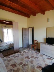 Postel nebo postele na pokoji v ubytování agriturismo oca giuliva