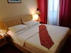 Letto o letti in una camera di Hotel N