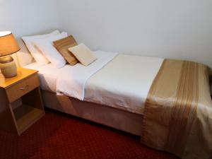 Letto o letti in una camera di Hotel N