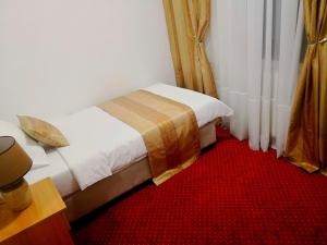 Letto o letti in una camera di Hotel N