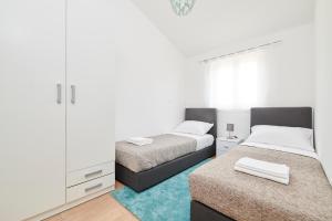 Posteľ alebo postele v izbe v ubytovaní Villa Maris + 18 fotografií