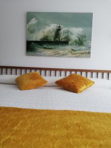 Posteľ alebo postele v izbe v ubytovaní Hostal Pereiriña