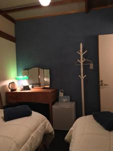 Uma cama ou camas num quarto em DJANGO Hostel & Lounge