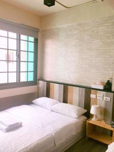 Fotografie z fotogalerie ubytování 輕停文旅 小洋房Light Stay花蓮火車站-自助式入住 v destinaci Chua-lien