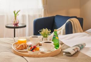 Posteľ alebo postele v izbe v ubytovaní Residence Vocelova