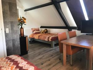 Giường trong phòng chung tại Bed&Breakfast Maasland