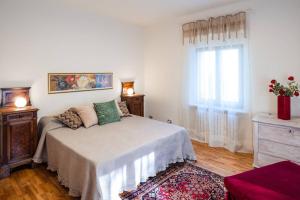 Postel nebo postele na pokoji v ubytování Villa Monte Illuminato