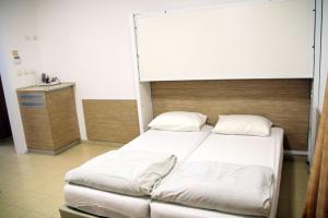 Letto o letti in una camera di HI - Massada Hostel